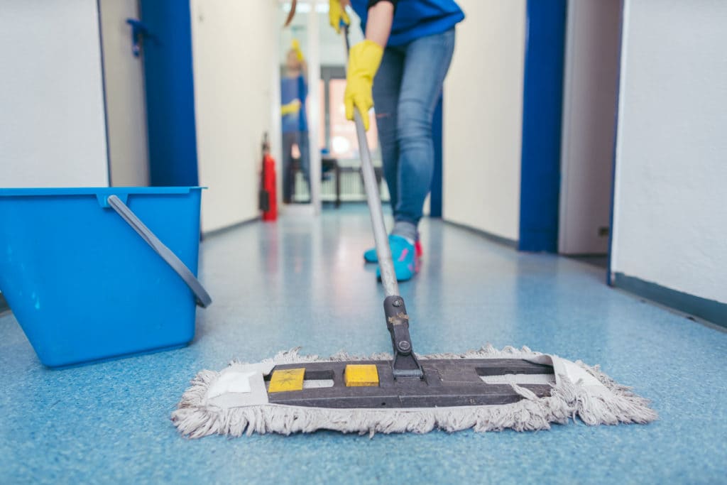 Weekly commercial floor cleaning in Austin — professional cleaners maintain hygiene with non-toxic solutions