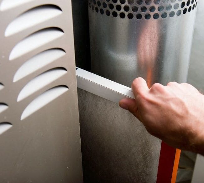 Air duct inspection and cleaning process using a negative air machine and HEPA vacuuming for dust-free environment.