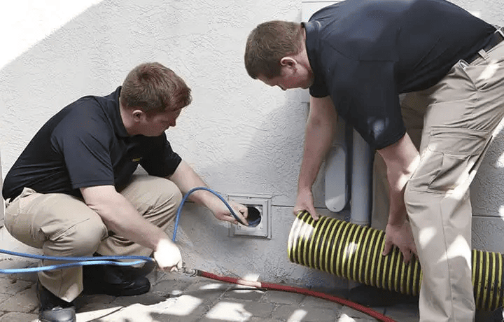 Certified technicians conducting thorough dryer vent cleaning and residential air duct cleaning for fire prevention and improved indoor air quality in Denver